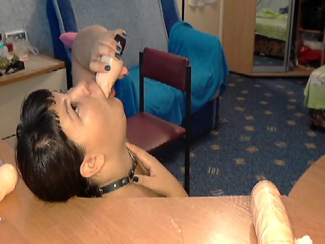 Luscious Asian Deep Throats Her Cock-shaped Dildo